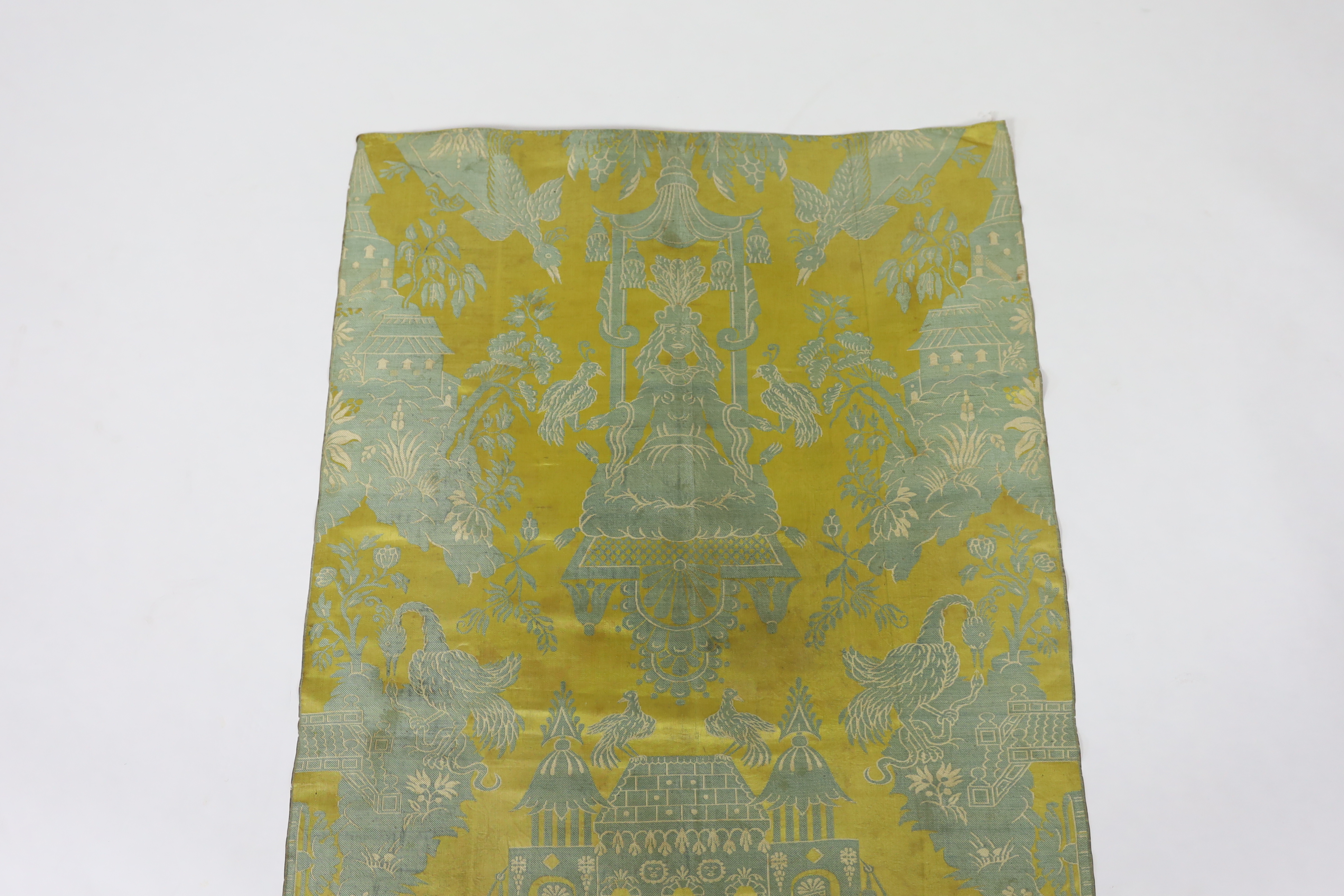 A large 19th century chinoiserie silk two colour damask panel, possibly Lyon, with large repeat, woven in turquoise on gold silk, with cream outlines, 130cm long, 74cm wide